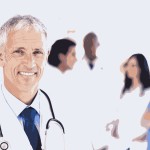 Smiling doctor waiting for his team while standing upright