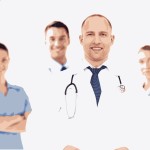 smiling male doctor with stethoscope